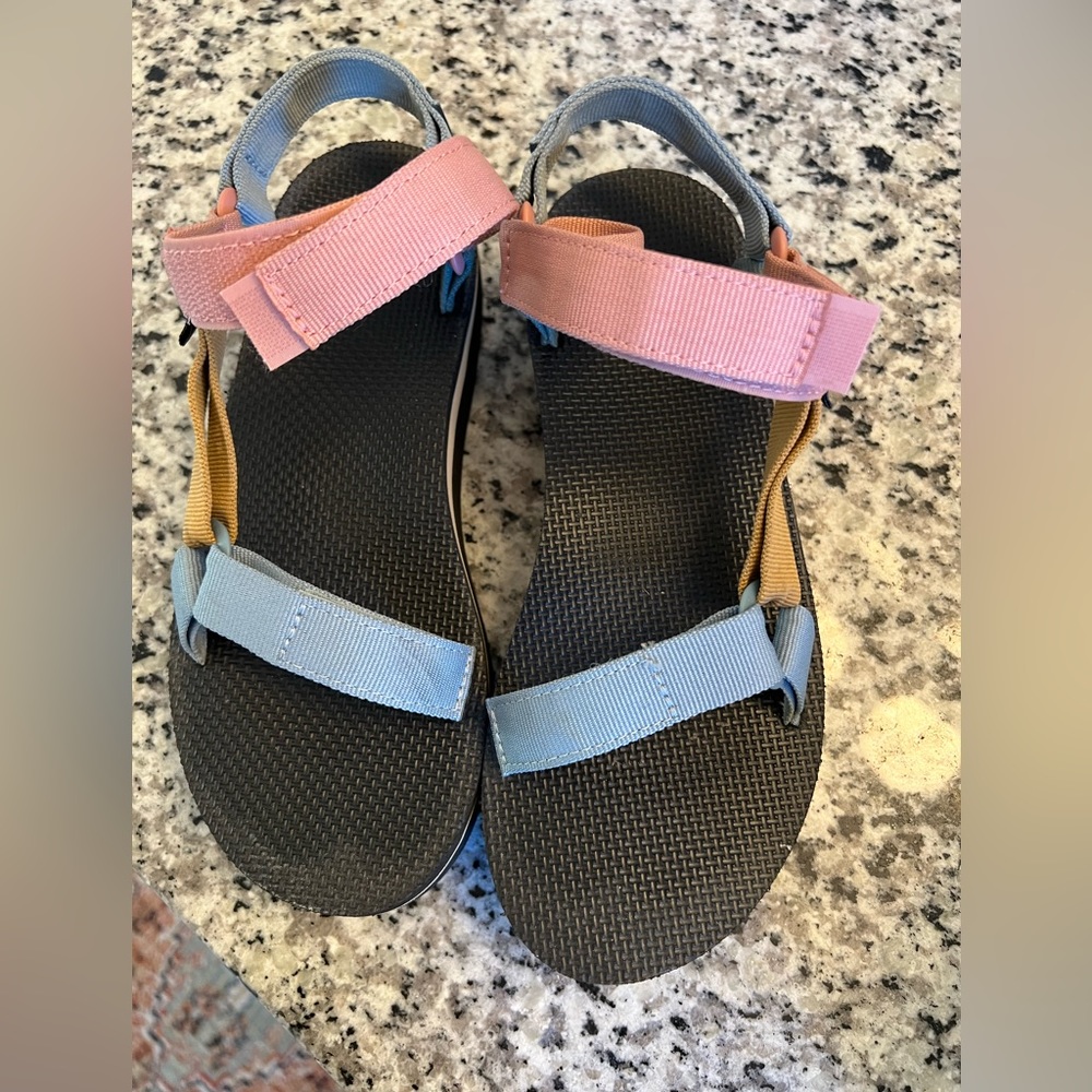 Teva flat form sandals size 8.